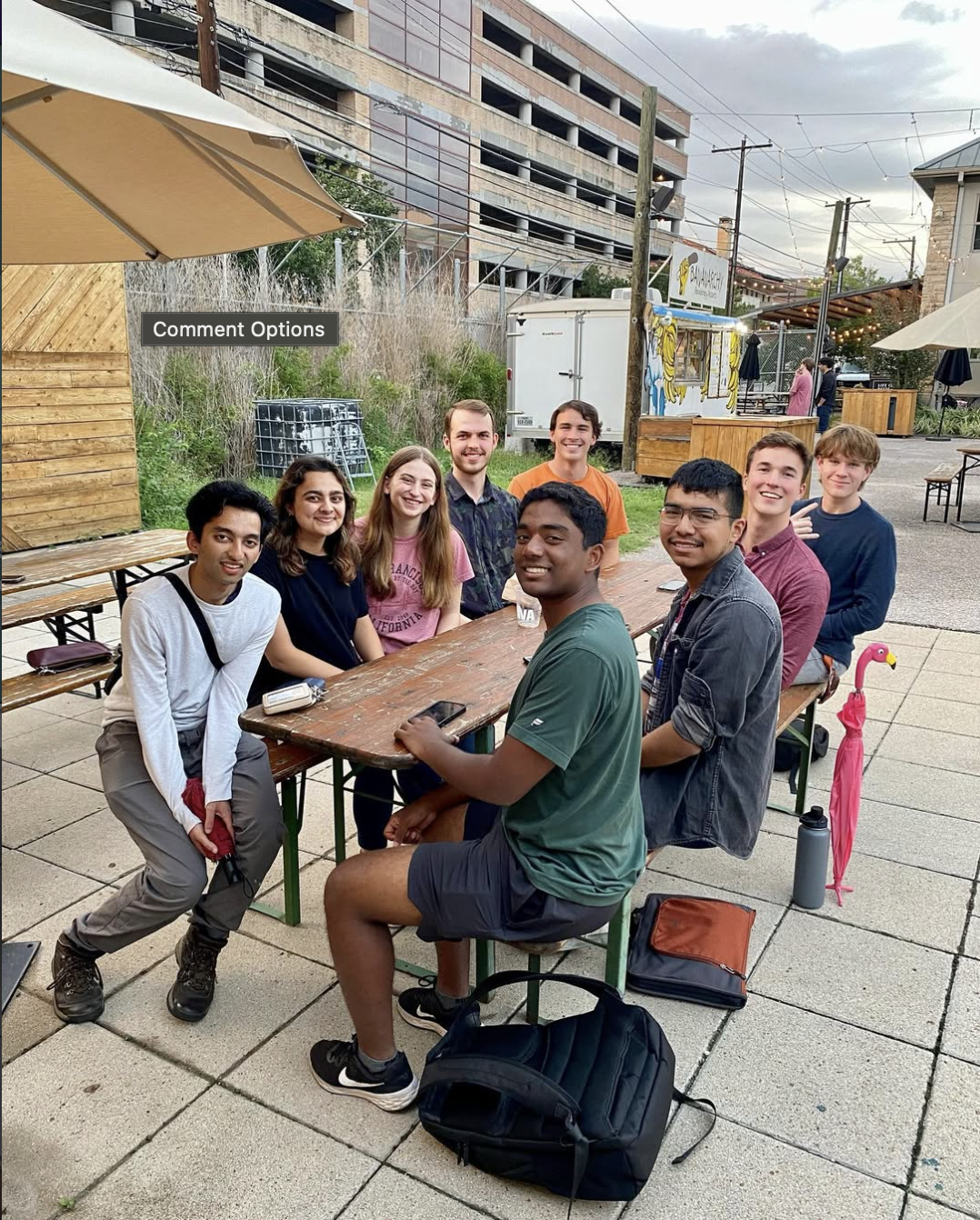 WMSO members seated together at an outdoor social.