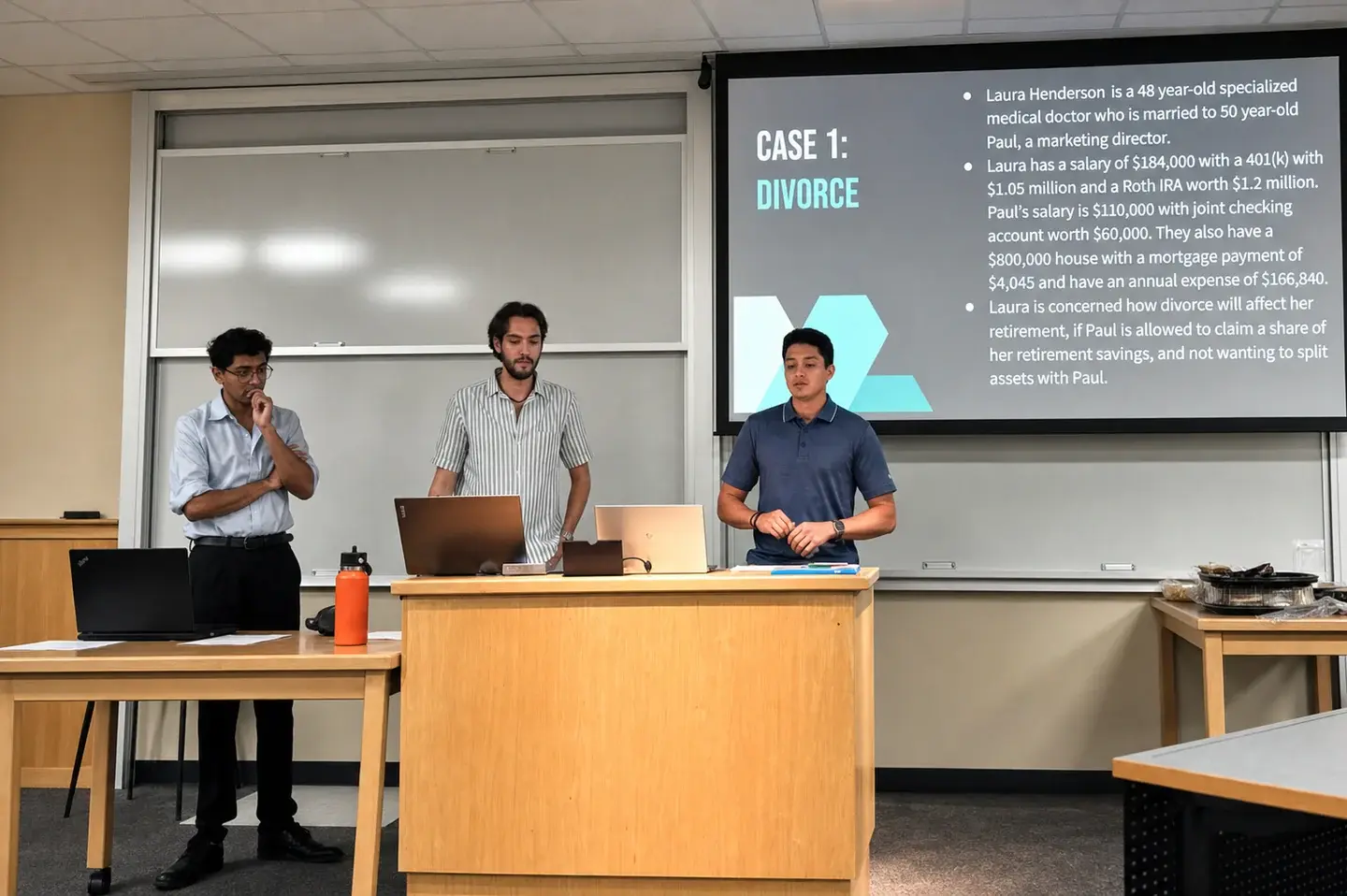 Three WMSO students presenting a financial-planning case.