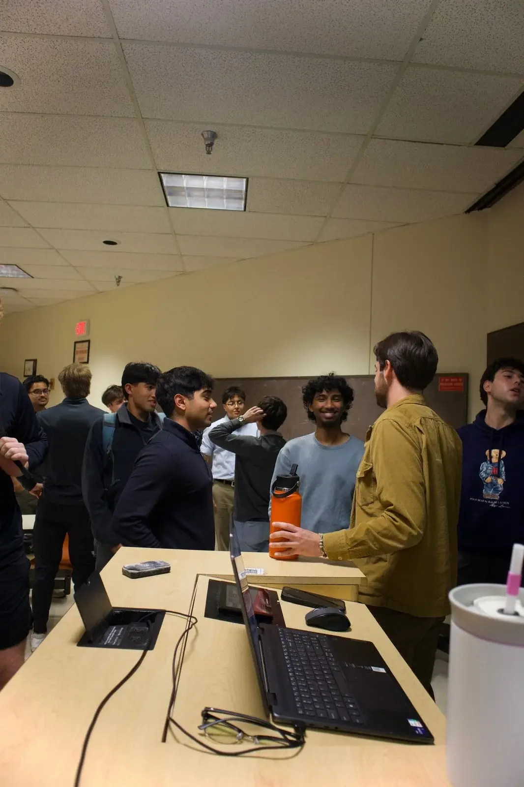 Prospective members networking during a WMSO information session.